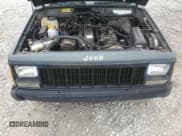 ✅ 1993 Jeep Cherokee Sport • VIN: 1J4FT68S4PL588241 • Lot: 80115884. Listed on Copart with 204,174 mi. Free auction sales archive from the USA and detailed vehicle history report at DreamBid. Image 11.