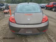 ✅ 2012 Volkswagen Beetle 2.5L • VIN: 3VWJX7ATXCM620130 • Lot: 94797455. Listed on Copart with Not provided. Free auction sales archive from the USA and detailed vehicle history report at DreamBid. Image 6.