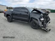 ✅ 2023 Toyota Tacoma SR5 • VIN: 3TYAZ5CN8PT031801 • Lot: 86067835. Listed on Copart with 27,793 mi. Free auction sales archive from the USA and detailed vehicle history report at DreamBid. Image 4.