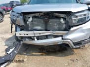 ✅ 2023 Honda Passport EX-L • VIN: 5FNYF8H50PB019594 • Lot: 42882366. Listed on IAAI with 26,120 mi. Free auction sales archive from the USA and detailed vehicle history report at DreamBid. Image 6.