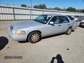 ✅ 2003 Mercury Grand Marquis LS Premium • VIN: 2MEFM75W13X618050 • Лот: 91239275. Опубликован ранее на Copart с пробегом 144 685 миль. Бесплатный доступ к архиву аукционных продаж из США и подробный отчёт об истории автомобиля на DreamBid. Изображение 1.