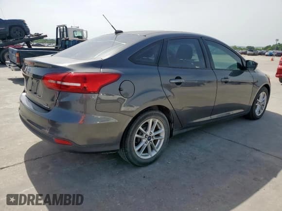 ✅ 2015 Ford Focus SE • VIN: 1FADP3F27FL313650 • Lot: 57183745. Wystawiony na Copart z przebiegiem 95 413 mil. Bezpłatny archiwum sprzedaży aukcyjnych z USA i szczegółowy raport historii pojazdu na DreamBid. Zdjęcie 3.