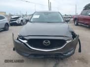 ✅ 2021 Mazda CX-5 Touring • VIN: JM3KFBCM5M0362002 • Lot: 43632624. Wystawiony na IAAI z przebiegiem 76 380 mil. Bezpłatny archiwum sprzedaży aukcyjnych z USA i szczegółowy raport historii pojazdu na DreamBid. Zdjęcie 12.