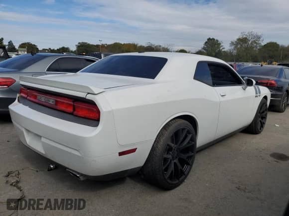 2012 Dodge Challenger R/T Plus с VIN 2C3CDYBT0CH259227, выставлен на аукционе Copart как лот 86333155 с пробегом Не указан миль и Списание • Salvage title. История ставок и продаж доступна на DreamBid. Изображение 3.