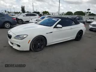 ✅ 2013 BMW 6 Series 650i • VIN: WBAYP9C53DDW21402 • Лот: 61458055. Опубликован ранее на Copart с пробегом 90 694 миль. Бесплатный доступ к архиву аукционных продаж из США и подробный отчёт об истории автомобиля на DreamBid. Изображение 1.