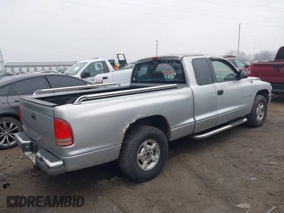 2002 Dodge Dakota SLT с VIN 1B7GL42N42S504550, выставлен на аукционе IAAI как лот 41552476 с пробегом 162 325 миль миль и . История ставок и продаж доступна на DreamBid. Изображение 4.