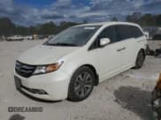 ✅ 2015 Honda Odyssey Touring Elite • VIN: 5FNRL5H91FB034652 • Lot: 85344475. Listed on Copart with 141,950 mi. Free auction sales archive from the USA and detailed vehicle history report at DreamBid. Image 1.