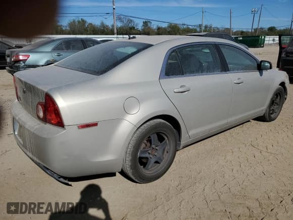 ✅ 2010 Chevrolet Malibu 1LS • VIN: 1G1ZB5EB2AF123119 • Lot: 82547784. Listed on Copart with 216,309 mi. Free auction sales archive from the USA and detailed vehicle history report at DreamBid. Image 3.