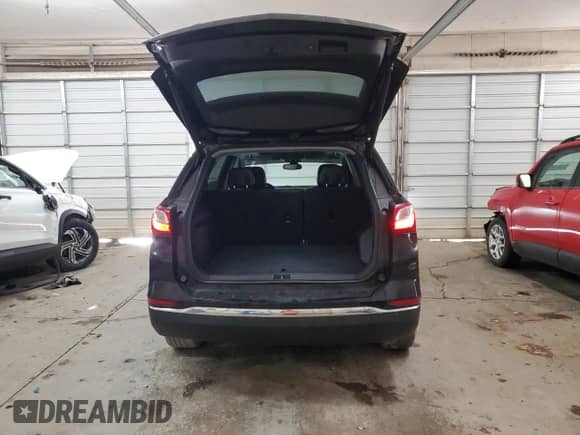 2018 Chevrolet Equinox Premier с VIN 3GNAXPEU2JL181831, выставлен на аукционе Copart как лот 47284595 с пробегом 108 960 миль миль и Списание • Salvage title. История ставок и продаж доступна на DreamBid. Изображение 6.