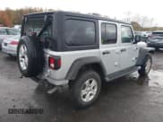 ✅ 2022 Jeep Wrangler Unlimited Sport S • VIN: 1C4HJXDG3NW132089 • Lot: 43575037. Listed on IAAI with 64,052 mi. Free auction sales archive from the USA and detailed vehicle history report at DreamBid. Image 4.