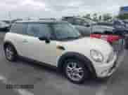 2013 MINI Hardtop with VIN WMWSU3C51DT687156, listed as a IAAI auction lot 42750063 with 93,002 mi miles and . Bid and sale history available at DreamBid. Image 1.