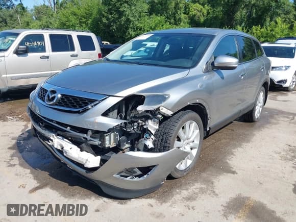 ✅ 2010 Mazda CX-9 Grand Touring • VIN: JM3TB3MA7A0231370 • Лот: 42526235. Опубликован ранее на IAAI с пробегом 164 794 миль. Бесплатный доступ к архиву аукционных продаж из США и подробный отчёт об истории автомобиля на DreamBid. Изображение 2.