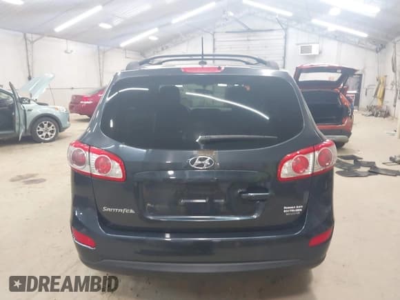 ✅ 2012 Hyundai Santa Fe GLS • VIN: 5XYZGDAG2CG096251 • Lot: 43510082. Listed on IAAI with 160,994 mi. Free auction sales archive from the USA and detailed vehicle history report at DreamBid. Image 16.