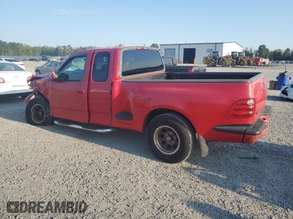 ✅ 2001 Ford F-150 XL • VIN: 2FTRX07LX1CA30894 • Лот: 74761224. Опубликован ранее на Copart с пробегом Не указан. Бесплатный доступ к архиву аукционных продаж из США и подробный отчёт об истории автомобиля на DreamBid. Изображение 2.