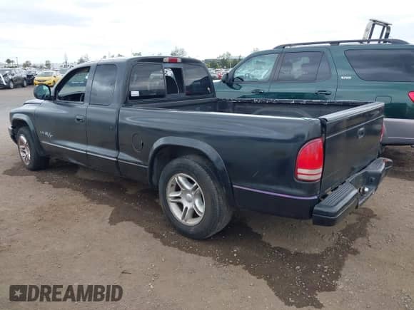1999 Dodge Dakota Sport with VIN 1B7GL22ZXXS129018, listed as a IAAI auction lot 42050078 with 133,241 mi miles and . Bid and sale history available at DreamBid. Image 3.