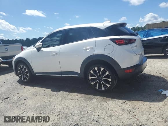✅ 2019 Mazda CX-3 Grand Touring • VIN: JM1DKDD78K0403494 • Лот: 66228615. Опубликован ранее на Copart с пробегом 94 527 миль. Бесплатный доступ к архиву аукционных продаж из США и подробный отчёт об истории автомобиля на DreamBid. Изображение 2.