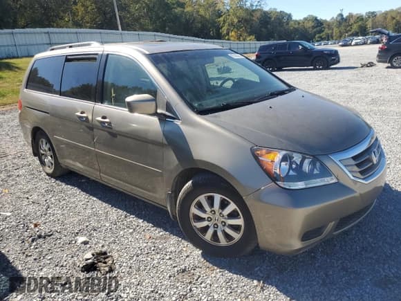 ✅ 2010 Honda Odyssey EX-L • VIN: 5FNRL3H67AB076181 • Лот: 87393285. Опубликован ранее на Copart с пробегом 223 916 миль. Бесплатный доступ к архиву аукционных продаж из США и подробный отчёт об истории автомобиля на DreamBid. Изображение 4.