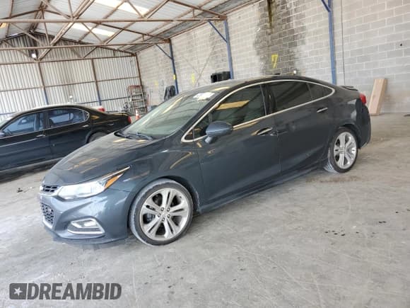 ✅ 2017 Chevrolet Cruze Premier • VIN: 1G1BF5SM7H7220655 • Lot: 42822373. Listed on Copart with 50,781 mi. Free auction sales archive from the USA and detailed vehicle history report at DreamBid. Image 1.