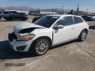 ✅ 2011 Volvo C30 • VIN: YV1672MKXB2198391 • Lot: 80393404. Listed on Copart with 130,924 mi. Free auction sales archive from the USA and detailed vehicle history report at DreamBid. Image 1.