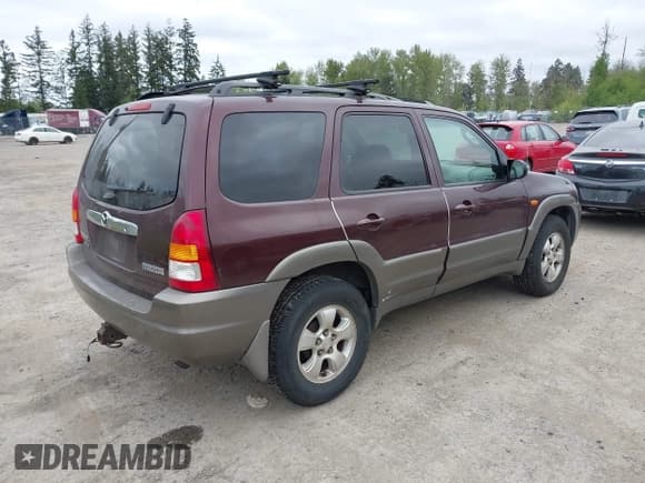 ✅ 2001 Mazda Tribute LX • VIN: 4F2CU08141KM10269 • Лот: 42138704. Опубликован ранее на IAAI с пробегом 166 825 миль. Бесплатный доступ к архиву аукционных продаж из США и подробный отчёт об истории автомобиля на DreamBid. Изображение 4.