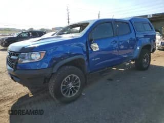 ✅ 2019 Chevrolet Colorado 4WD ZR2 • VIN: 1GCPTEE12K1307025 • Лот: 69978555. Опубликован ранее на Copart с пробегом 103 041 миль. Бесплатный доступ к архиву аукционных продаж из США и подробный отчёт об истории автомобиля на DreamBid. Изображение 1.