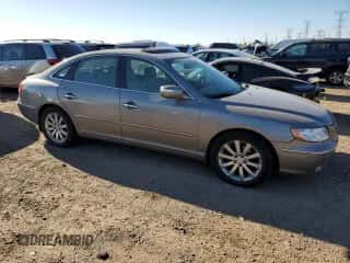 2009 Hyundai Azera Limited z VIN KMHFC46F09A381047, wystawiony jako Copart lot #71802614 z przebiegiem 106 632 mil mil oraz Szkoda całkowita • Salvage title. Historia ofert i sprzedaży dostępna na DreamBid. Obrazek 4.