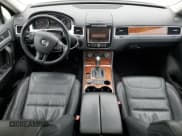 ✅ 2013 Volkswagen Touareg Lux • VIN: WVGEF9BP0DD001551 • Lot: 59818225. Listed on Copart with 171,653 mi. Free auction sales archive from the USA and detailed vehicle history report at DreamBid. Image 8.