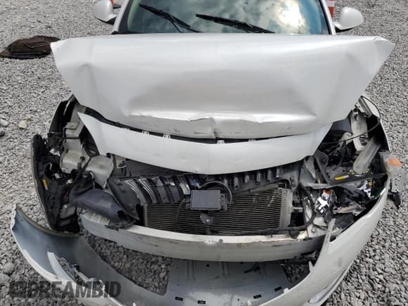 ✅ 2016 Buick Regal Premium II • VIN: 2G4GT5GX2G9121212 • Lot: 64900125. Listed on Copart with 132,056 mi. Free auction sales archive from the USA and detailed vehicle history report at DreamBid. Image 11.