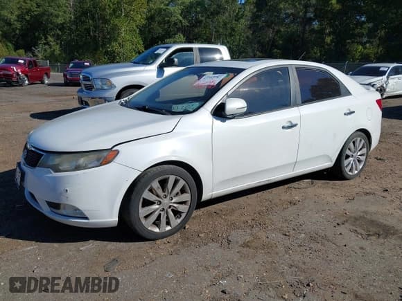 ✅ 2013 Kia Forte SX • VIN: KNAFW4A37D5677853 • Lot: 43382787. Listed on IAAI with 132,827 mi. Free auction sales archive from the USA and detailed vehicle history report at DreamBid. Image 2.