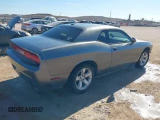 ✅ 2012 Dodge Challenger SXT • VIN: 2C3CDYAGXCH285791 • Lot: 41613090. Wystawiony na IAAI z przebiegiem 182 466 mil. Bezpłatny archiwum sprzedaży aukcyjnych z USA i szczegółowy raport historii pojazdu na DreamBid. Zdjęcie 4.