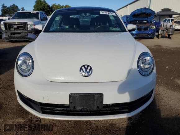 ✅ 2014 Volkswagen Beetle 2.0L TDI w/Sun/Sound/Nav • VIN: 3VWJL7ATXEM640246 • Лот: 69774095. Опубликован ранее на Copart с пробегом 155 361 миль. Бесплатный доступ к архиву аукционных продаж из США и подробный отчёт об истории автомобиля на DreamBid. Изображение 5.