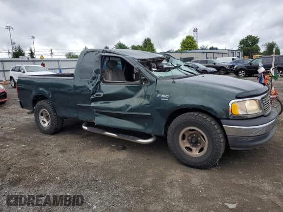 ✅ 2001 Ford F-150 XL • VIN: 1FTRX17L41NA90489 • Lot: 67060015. Listed on Copart with 143,360 mi. Free auction sales archive from the USA and detailed vehicle history report at DreamBid. Image 4.