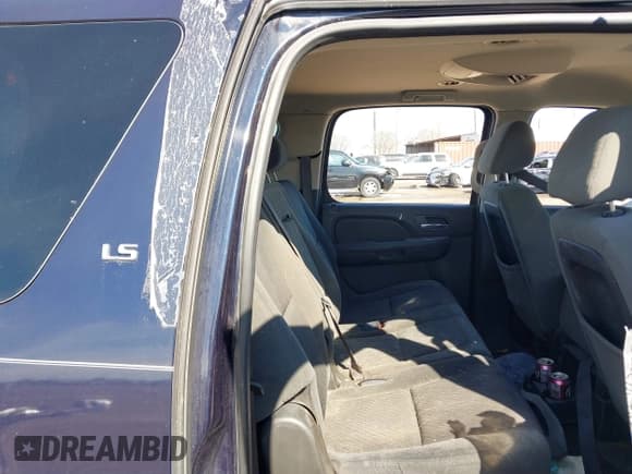 ✅ 2009 Chevrolet Suburban LS • VIN: 1GNFC16029R200974 • Lot: 41370873. Listed on IAAI with 207,649 mi. Free auction sales archive from the USA and detailed vehicle history report at DreamBid. Image 8.