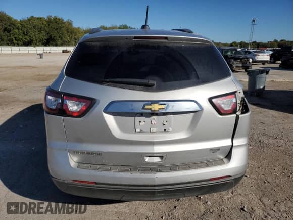 2017 Chevrolet Traverse LS with VIN 1GNKRFED7HJ145823, listed as a Copart auction lot 82596235 with 163,057 mi miles and Salvage title. Bid and sale history available at DreamBid. Image 6.