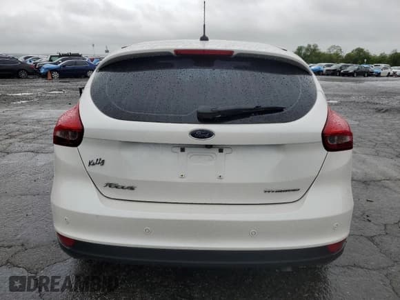 ✅ 2017 Ford Focus Titanium • VIN: 1FADP3N23HL244301 • Lot: 56625555. Listed on Copart with 96,304 mi. Free auction sales archive from the USA and detailed vehicle history report at DreamBid. Image 6.
