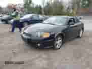 2003 Hyundai Tiburon GT with VIN KMHHN65F53U059705, listed as a IAAI auction lot 43573043 with 165,650 mi miles and . Bid and sale history available at DreamBid. Image 2.