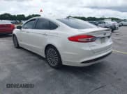 ✅ 2017 Ford Fusion Hybrid Titanium • VIN: 3FA6P0RU4HR250242 • Лот: 43224550. Опубликован ранее на IAAI с пробегом 178 522 миль. Бесплатный доступ к архиву аукционных продаж из США и подробный отчёт об истории автомобиля на DreamBid. Изображение 3.