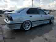 1996 BMW 3 Series z VIN WBACD3327TAV16674, wystawiony jako Copart lot #67942865 z przebiegiem 261 991 mil mil oraz Szkoda całkowita • Salvage title. Historia ofert i sprzedaży dostępna na DreamBid. Obrazek 3.