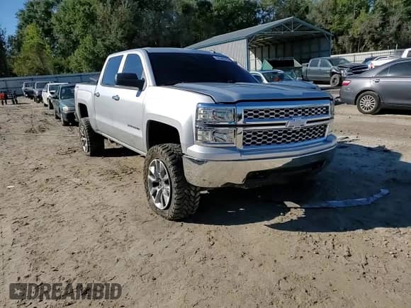 2014 Chevrolet Silverado 1500 LT с VIN 3GCUKREC6EG261591, выставлен на аукционе Copart как лот 86548715 с пробегом 188 777 миль миль и Списание • Salvage title. История ставок и продаж доступна на DreamBid. Изображение 13.