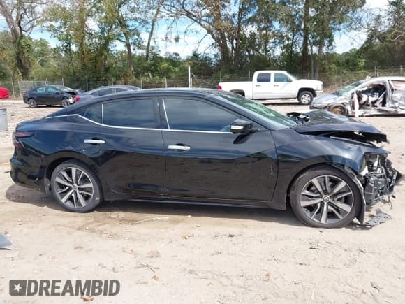 ✅ 2020 Nissan Maxima SL • VIN: 1N4AA6DV4LC373822 • Lot: 43410759. Listed on IAAI with 208,561 mi. Free auction sales archive from the USA and detailed vehicle history report at DreamBid. Image 14.