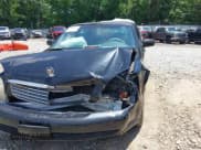 ✅ 2001 Cadillac DeVille Funeral Coach • VIN: 1GEEH90Y31U550819 • Lot: 41258778. Listed on IAAI with 49,587 mi. Free auction sales archive from the USA and detailed vehicle history report at DreamBid. Image 6.