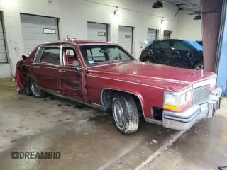 ✅ 1987 Cadillac Brougham • VIN: 1G6DW51Y8H9760303 • Лот: 59555665. Опубликован ранее на Copart с пробегом 34 784 миль. Бесплатный доступ к архиву аукционных продаж из США и подробный отчёт об истории автомобиля на DreamBid. Изображение 4.