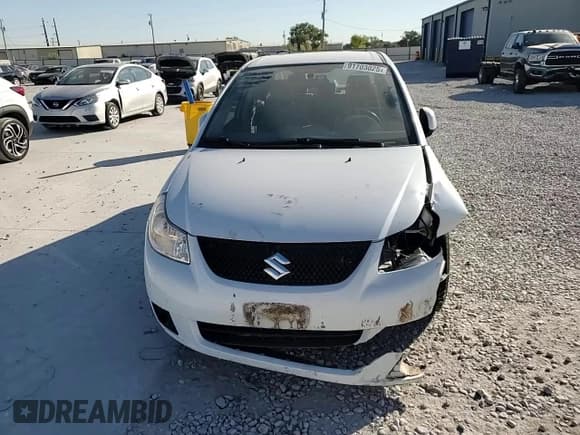 ✅ 2012 Suzuki SX4 LE • VIN: JS2YC5A37C6303297 • Lot: 91703025. Wystawiony na Copart z przebiegiem 113 870 mil. Bezpłatny archiwum sprzedaży aukcyjnych z USA i szczegółowy raport historii pojazdu na DreamBid. Zdjęcie 13.