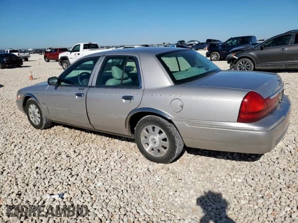 ✅ 2004 Mercury Grand Marquis LS Premium • VIN: 2MEFM75W34X605771 • Лот: 91042585. Опубликован ранее на Copart с пробегом 83 708 миль. Бесплатный доступ к архиву аукционных продаж из США и подробный отчёт об истории автомобиля на DreamBid. Изображение 2.