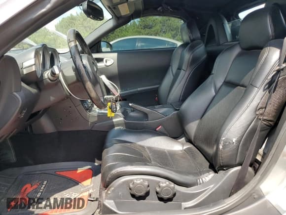 ✅ 2004 Nissan 350Z Touring • VIN: JN1AZ36A74T013329 • Lot: 68836465. Wystawiony na Copart z przebiegiem 184 894 mil. Bezpłatny archiwum sprzedaży aukcyjnych z USA i szczegółowy raport historii pojazdu na DreamBid. Zdjęcie 7.