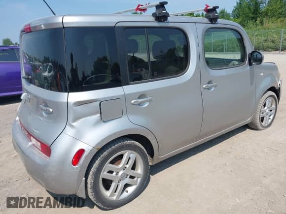 ✅ 2010 Nissan Cube S • VIN: JN8AZ2KRXAT160148 • Lot: 42865778. Listed on IAAI with 43,913 mi. Free auction sales archive from the USA and detailed vehicle history report at DreamBid. Image 4.