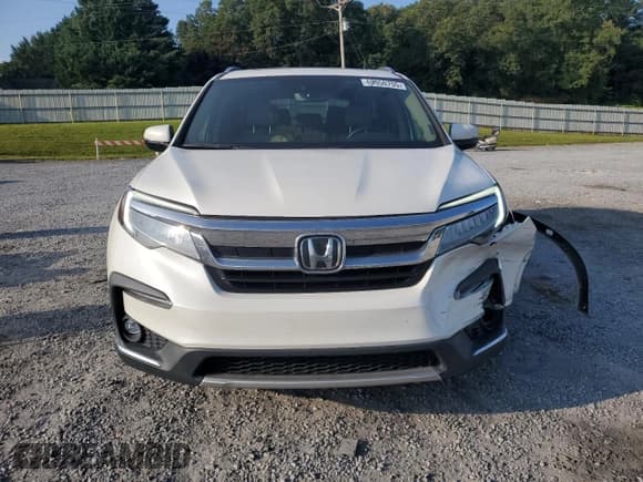 ✅ 2022 Honda Pilot Touring 8-Passenger • VIN: 5FNYF6H98NB036132 • Lot: 69950755. Listed on Copart with 82,012 mi. Free auction sales archive from the USA and detailed vehicle history report at DreamBid. Image 5.