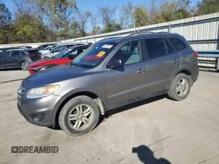 2012 Hyundai Santa Fe GLS с VIN 5XYZGDAB7CG121973, выставлен на аукционе Copart как лот 86326065 с пробегом 213 446 миль миль и Списание • Salvage title. История ставок и продаж доступна на DreamBid. Изображение 1.