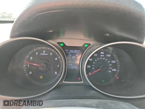 2012 Hyundai Veloster w/Gray Int с VIN KMHTC6AD8CU063025, выставлен на аукционе Copart как лот 81315585 с пробегом 166 284 миль миль и Списание • Salvage title. История ставок и продаж доступна на DreamBid. Изображение 9.