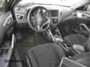 2014 Hyundai Veloster с VIN KMHTC6AD1EU189049, выставлен на аукционе Copart как лот 73875184 с пробегом 155 119 миль миль и Списание • Salvage title. История ставок и продаж доступна на DreamBid. Изображение 8.